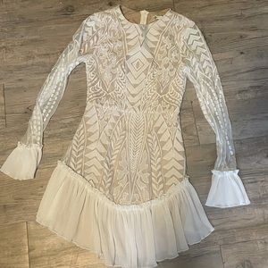 White dress worn by Mary Fitzgerald at her bachelorette party on Selling Sunset